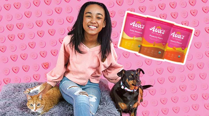 A girl with a cat and dog promoting her brand