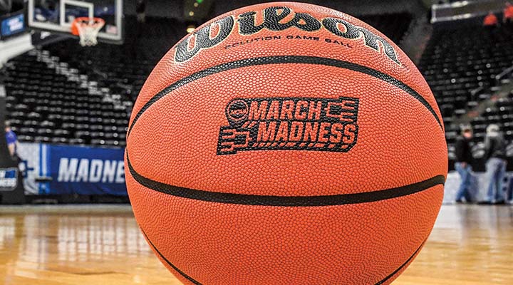 Basketball on a court. Text on ball reads: March Madness