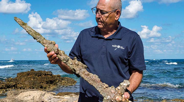 Old sword covered in barnacles
