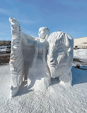 Image of a child and bison ice sculpture