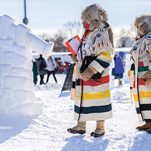Photo of judges walking through to score ice sculptures