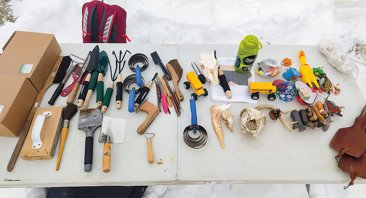 Photo of a table filled with a variety of tools